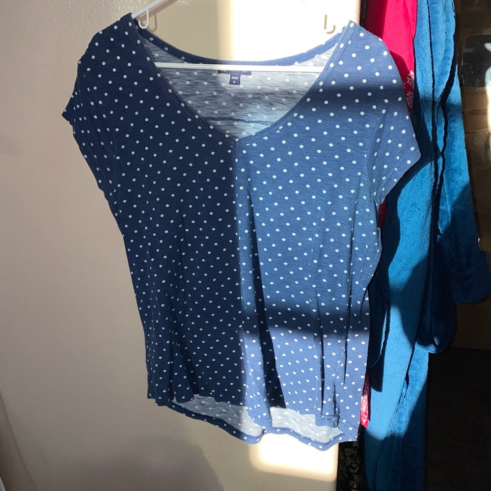 blue with white polka dots shirt